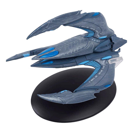 Front quarter view of the Xindi Insectoid starship replica showing its three swept-back wings mounted on a display stand