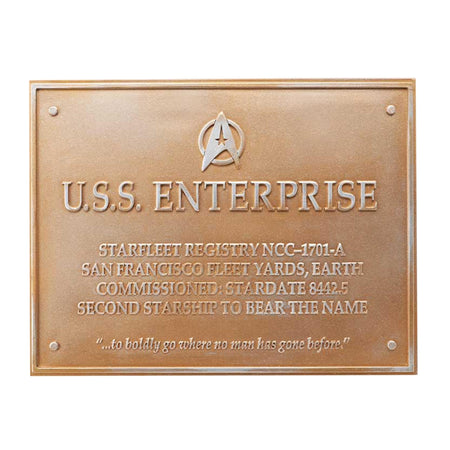 Eaglemoss replica of the USS Enterprise NCC-1701-A dedication plaque mounted on a wall