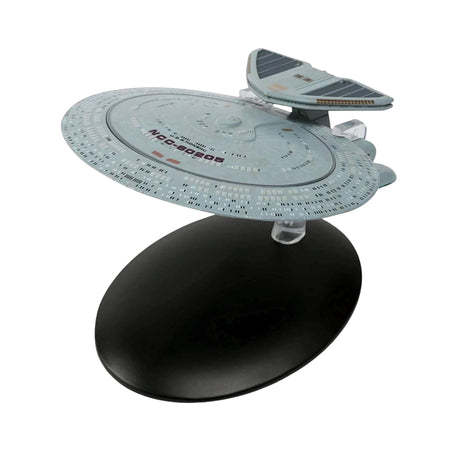 Front quarter profile view of the Nebula Class U.S.S. Honshu starship model on a display stand