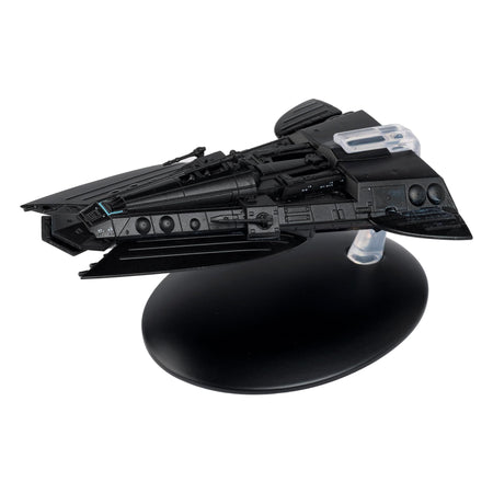 Front three-quarters view of the Star Trek Smugglers Ship die-cast model, displaying its unique hull geometry and weathered finish