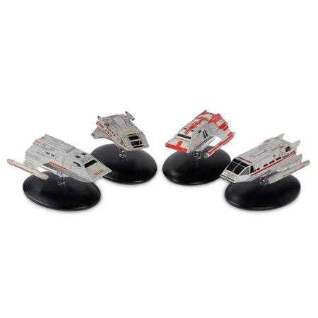 Complete Star Trek shuttlecraft model set displayed together against a starlight background