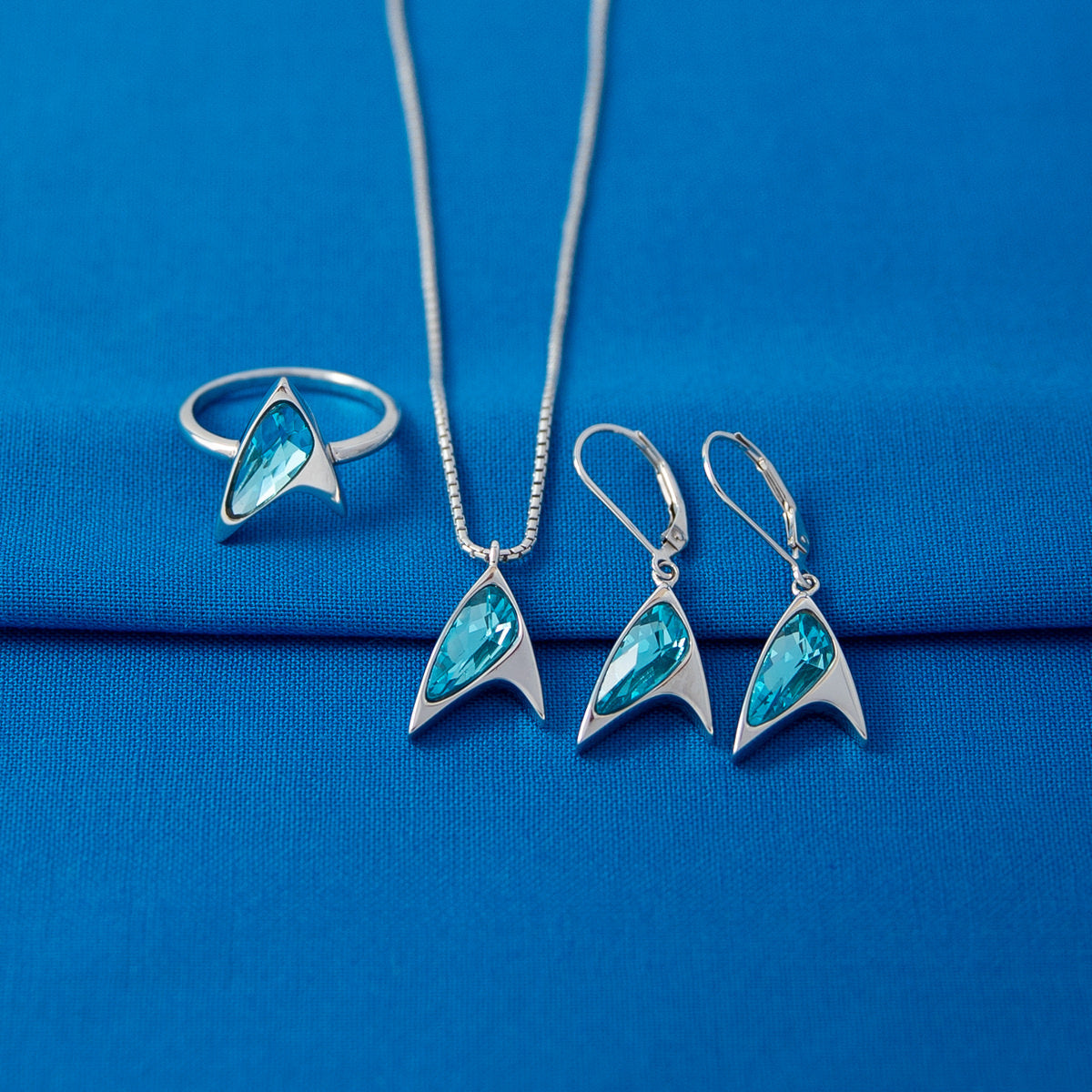 Side view of sculpted sterling silver setting for Blue Crystal Delta Ring