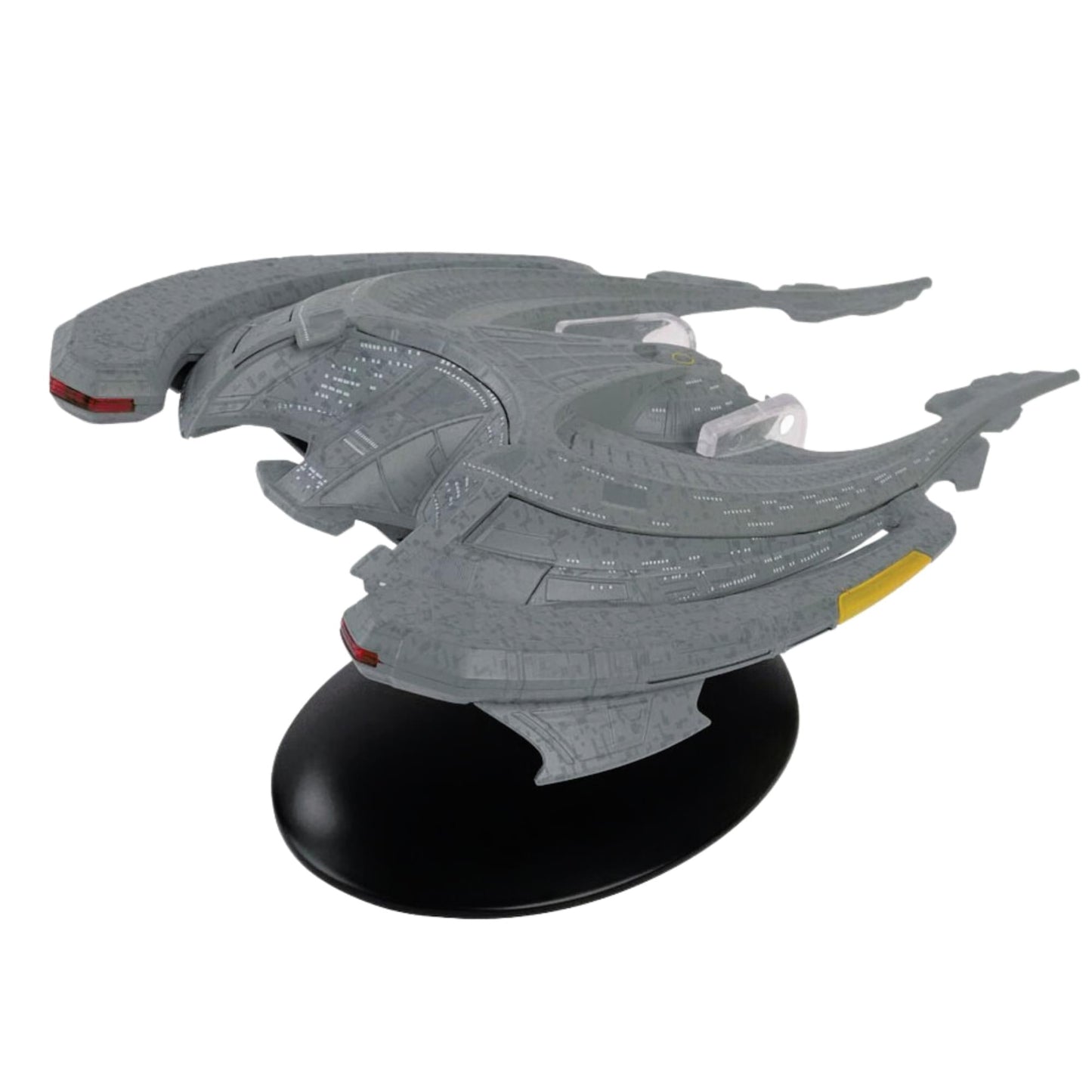 Side profile view showing the distinct aerodynamic lines and configuration of the alien vessel