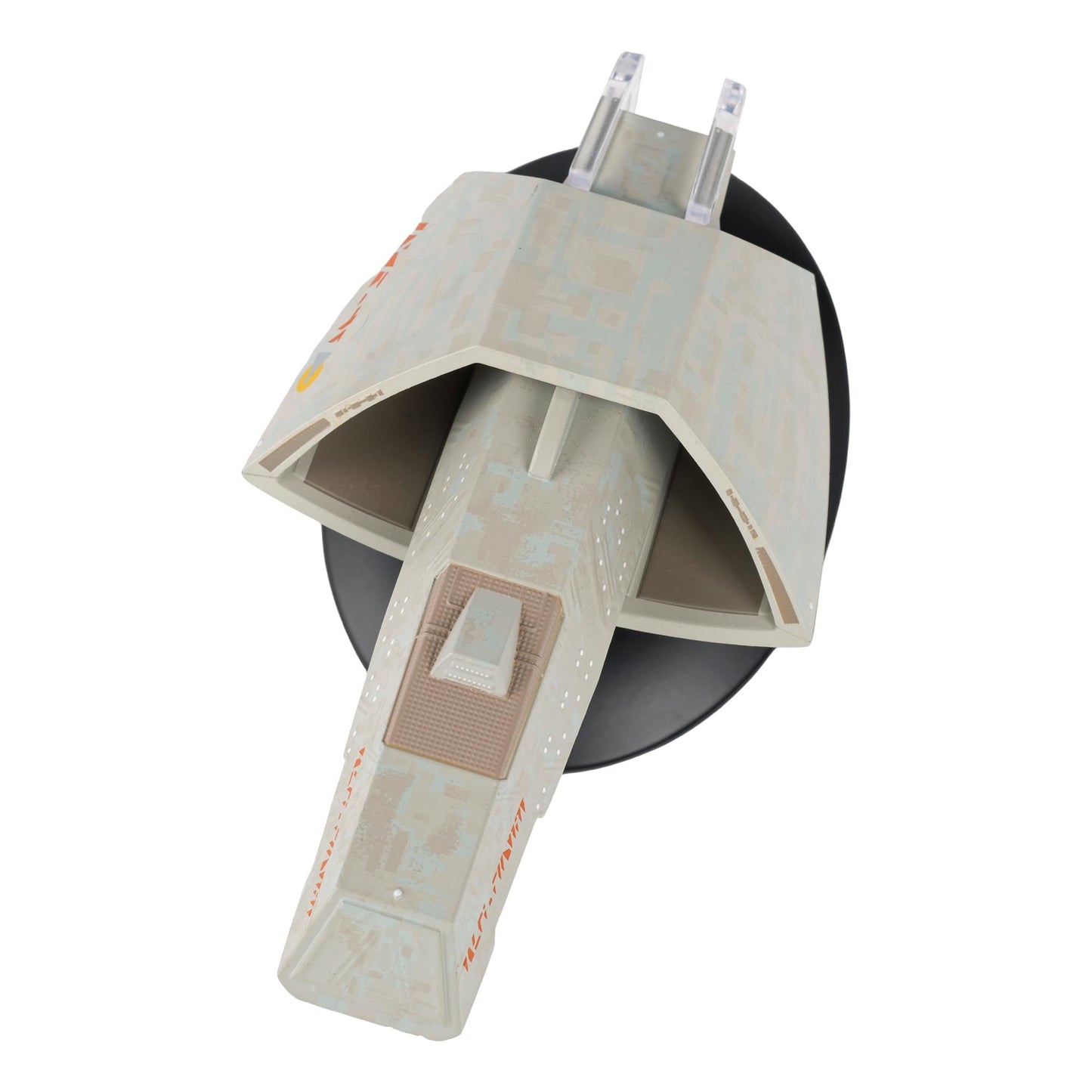 Close-up detail shot of the hand-painted hull markings and registry details on the starship model