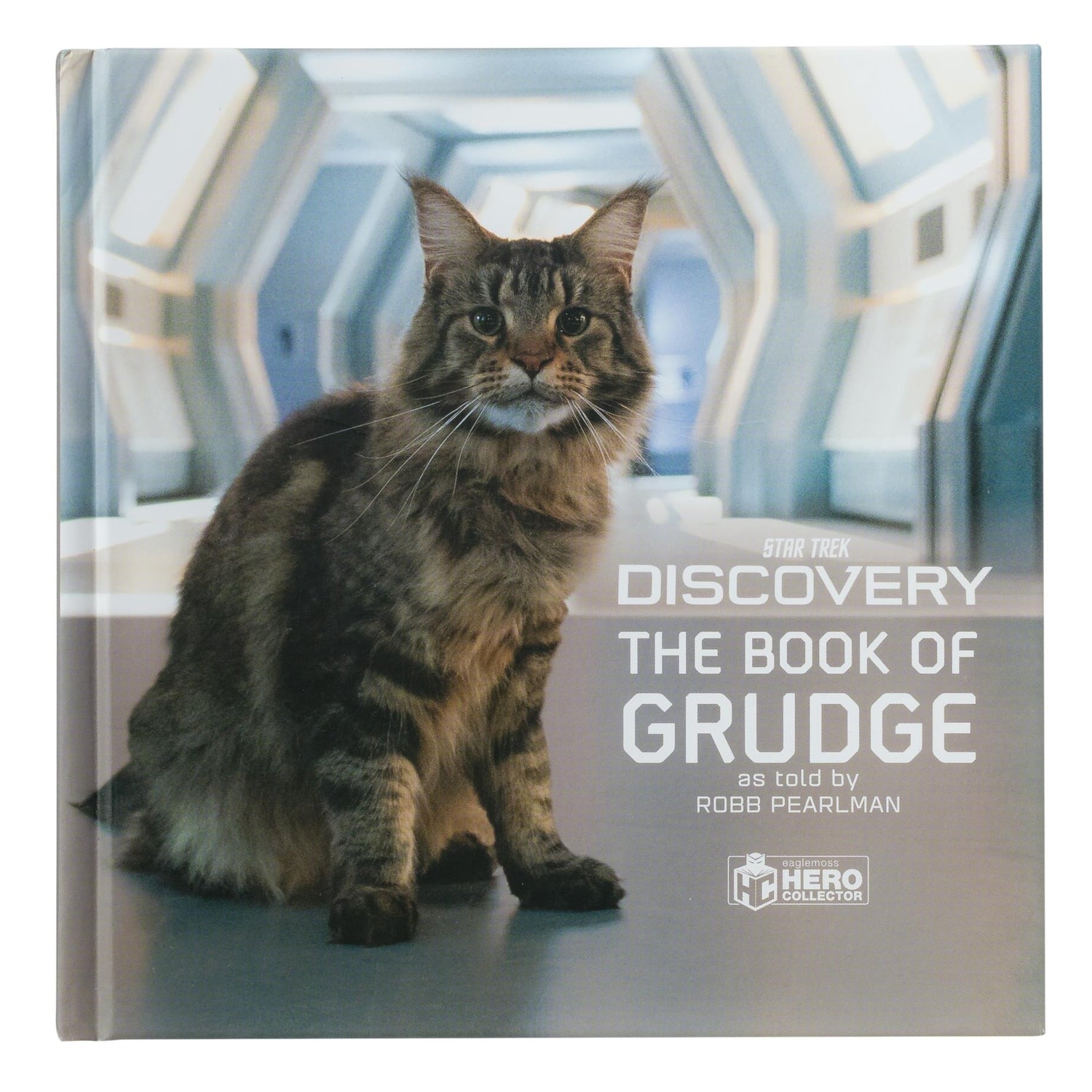 Front cover of Star Trek: Discovery The Book of Grudge featuring a portrait of Grudge the cat against a starlight background