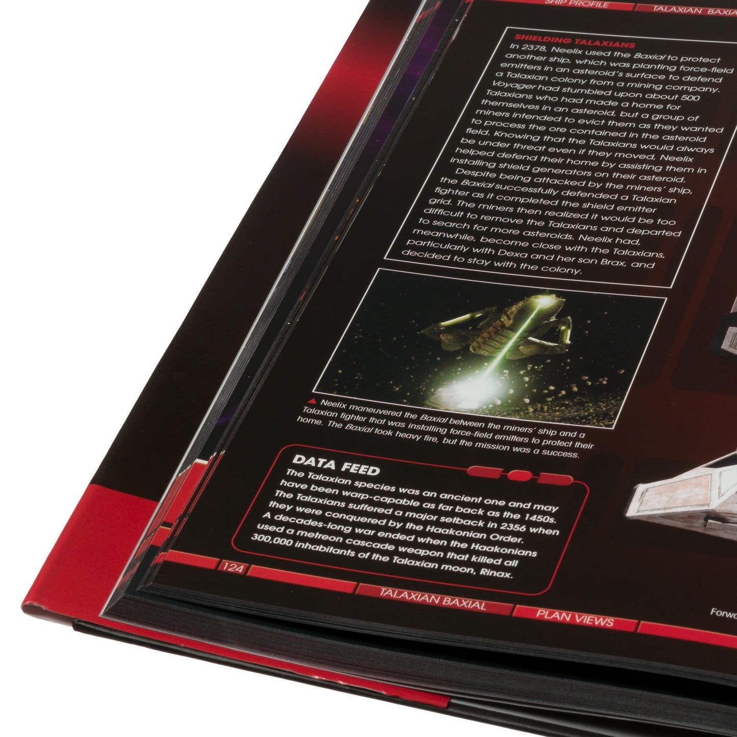Open spread of the book displaying detailed schematics and operational histories of Star Trek: Voyager vessels