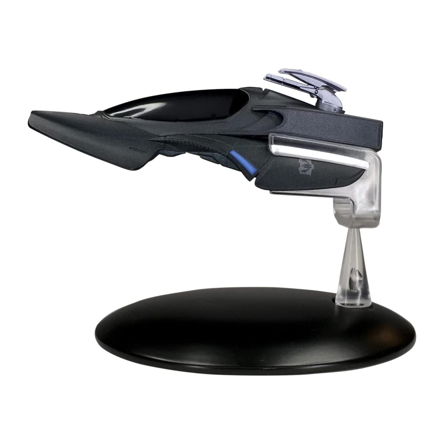 Side profile of the Reman Scorpion model on its display stand