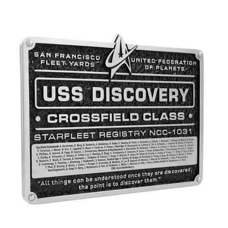 Close-up detail of the Starfleet insignia and NCC-1031 vessel registry on the Eaglemoss plaque