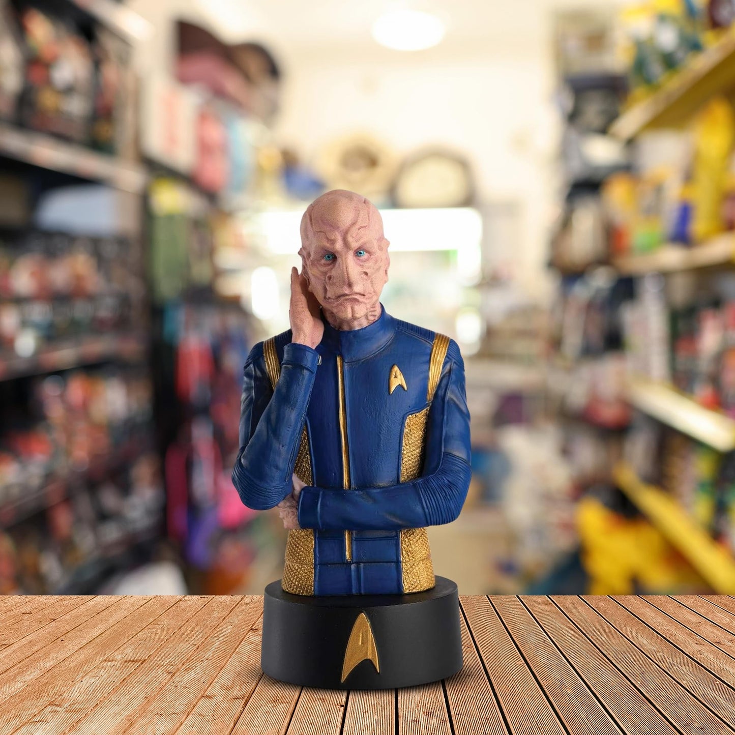 Lifestyle product shot of the Commander Saru bust displayed on a flat surface