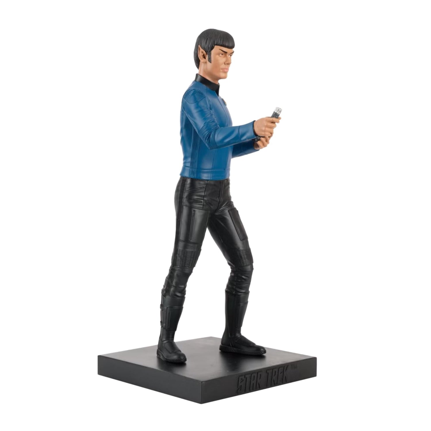 Side angle of the Spock figurine highlighting the uniform details and science tricorder accessory