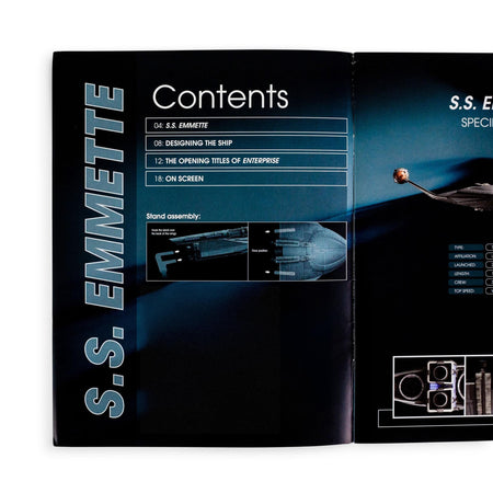 Close-up of the magazine interior showing historical schematics of the S.S. Emmette primary hull