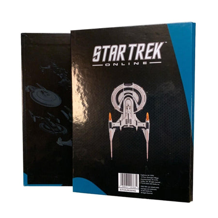 Close-up angle of the binder spine displaying Star Trek branding and collection details