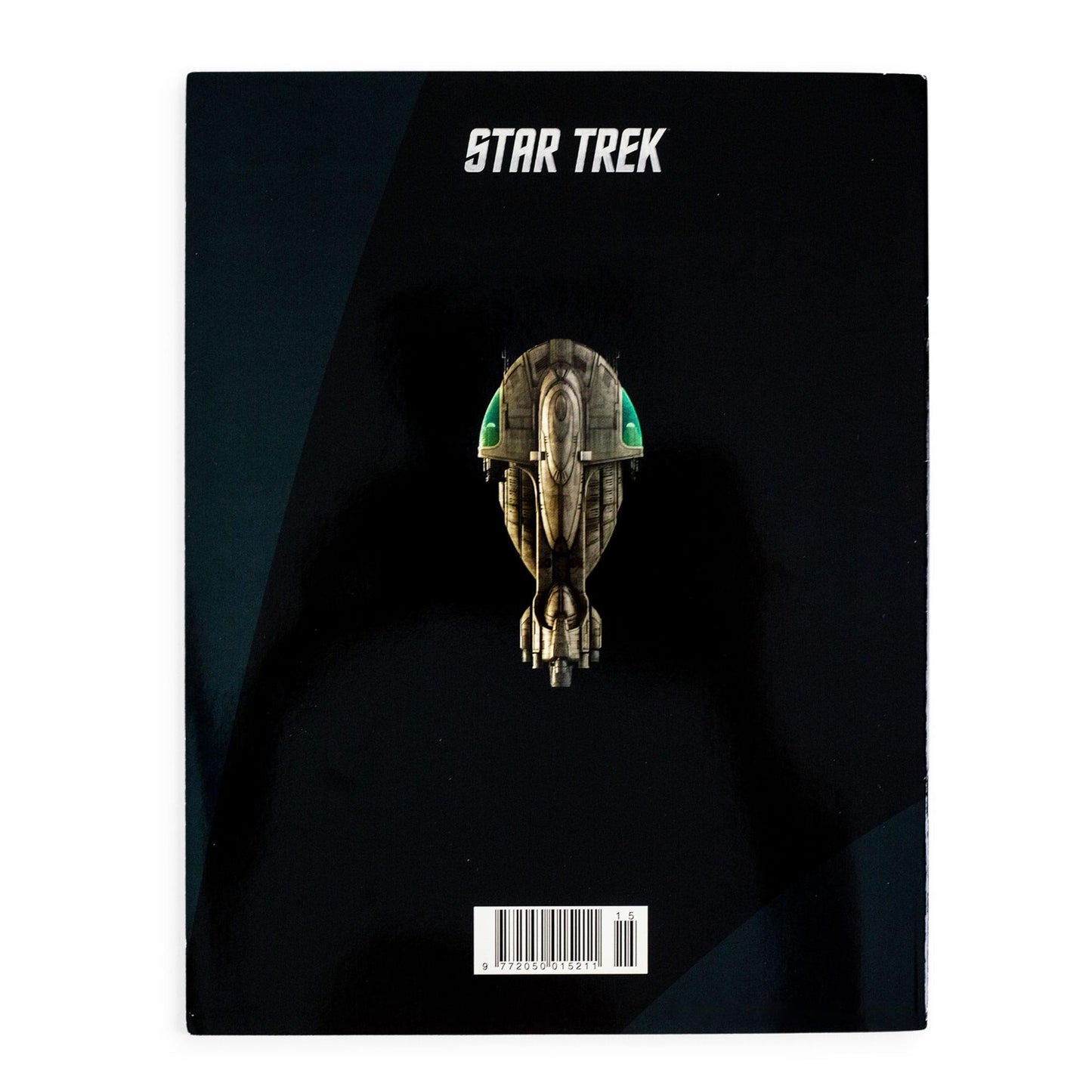Interior spread of the Star Trek magazine showing illustrated starship schematics and lore text