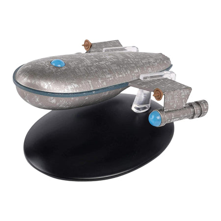 Collector starship model of Harry Mudd's Class J Ship viewed from the front profile against a starlight background