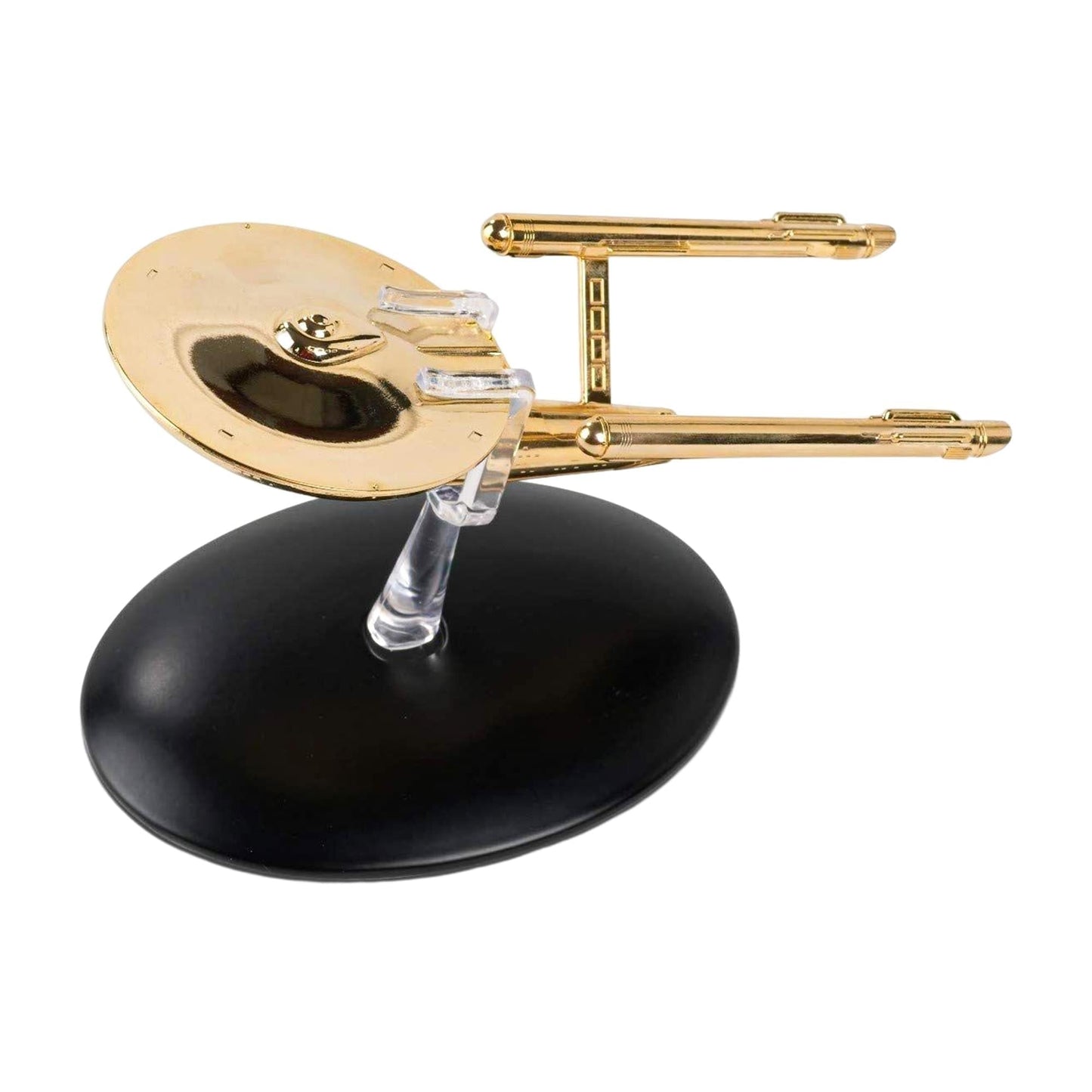 Rear view of the gold-plated starship model highlighting the impulse engines and warp nacelles