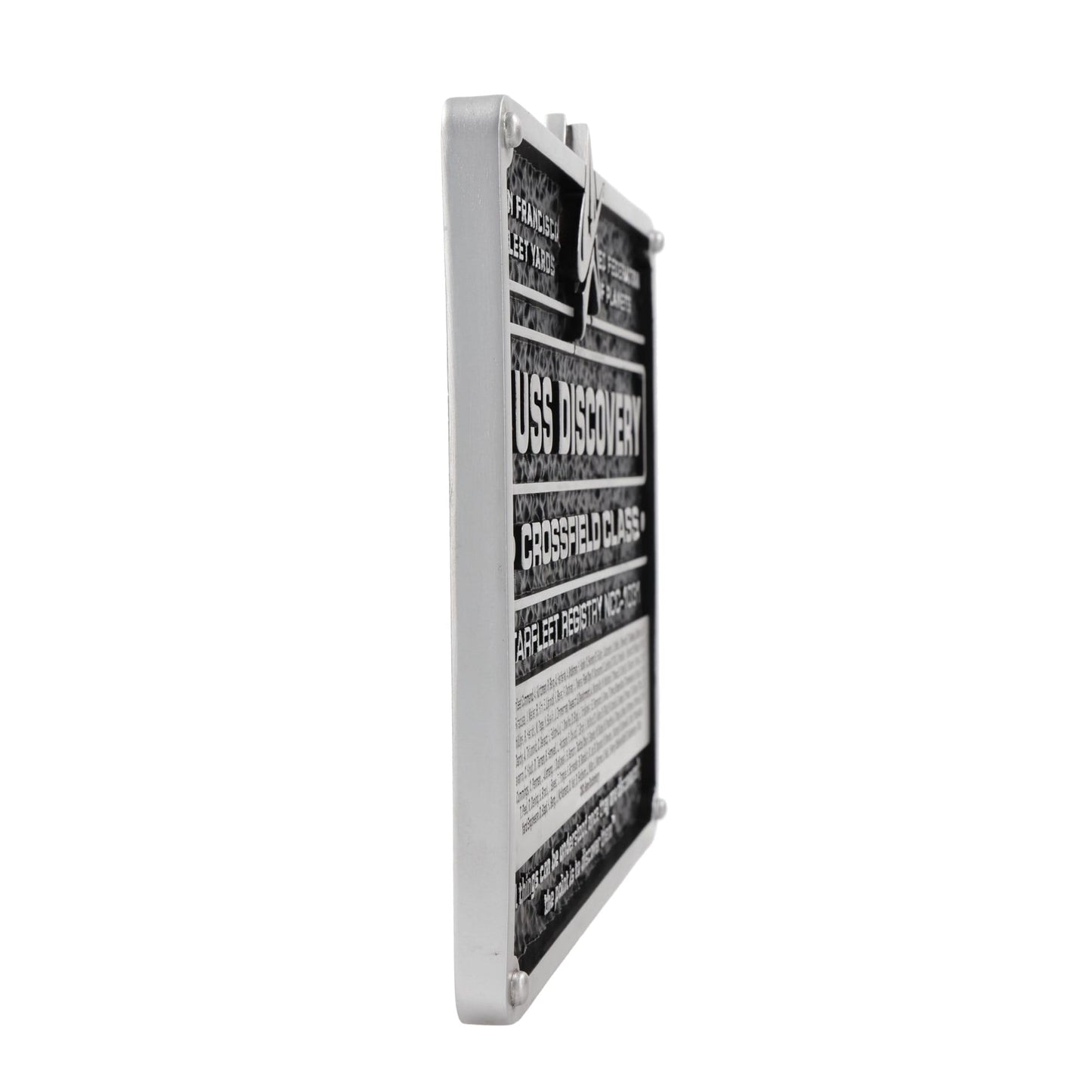 Angled profile view of the 9-inch rectangular dedication plaque showing its metallic finish and beveled edge