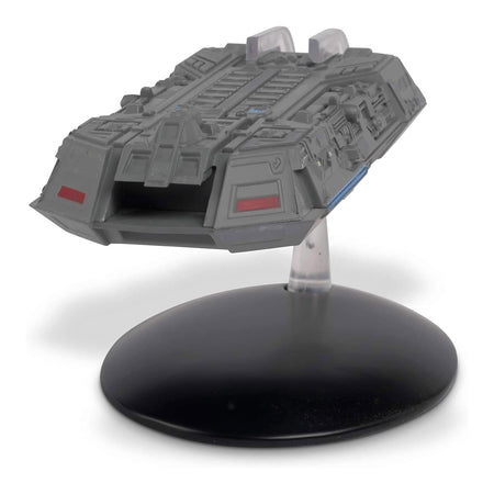 Profile view of the Federation Holoship replica, displaying the sleek lines and Starfleet insignia accents along the vessel.