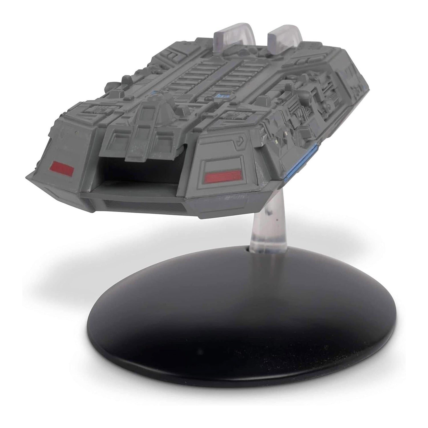 Profile view of the Federation Holoship replica, displaying the sleek lines and Starfleet insignia accents along the vessel.