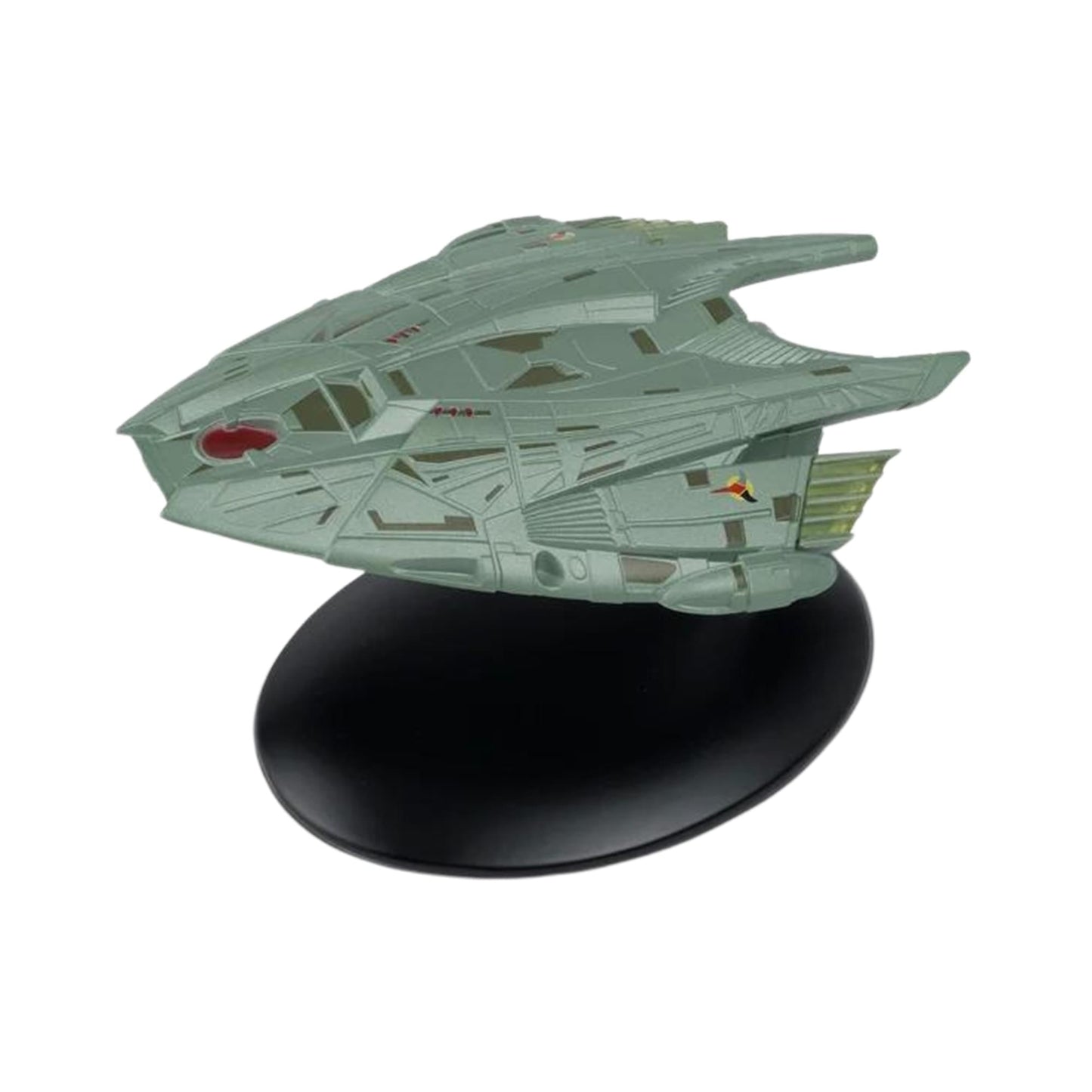 Side profile view of the Klingon Transport replica on its display stand, showcasing its sleek vertical geometry