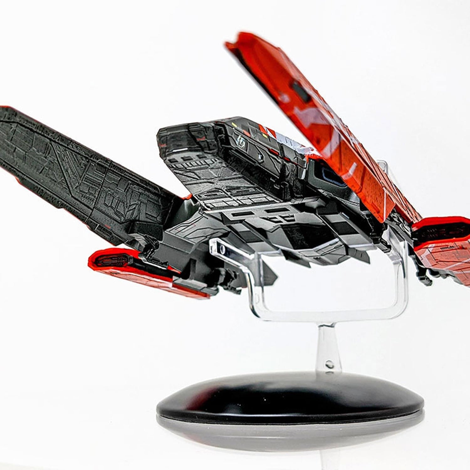 Angled perspective shot emphasizing the XL scale proportions and metallic finish