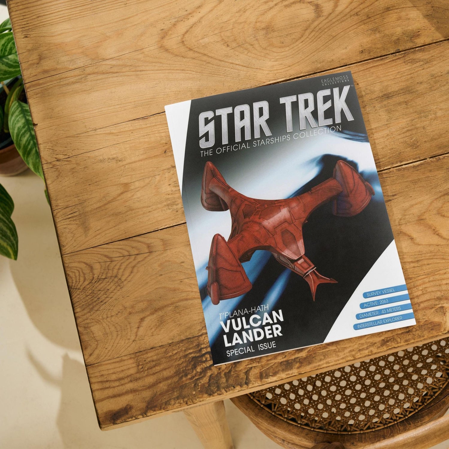 Open pages of the 20-page illustrated Star Trek magazine detailing Vulcan ship schematics and history