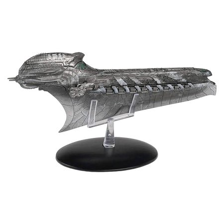 Port side angle view of the die-cast Klingon Cleave starship replica resting on a display base