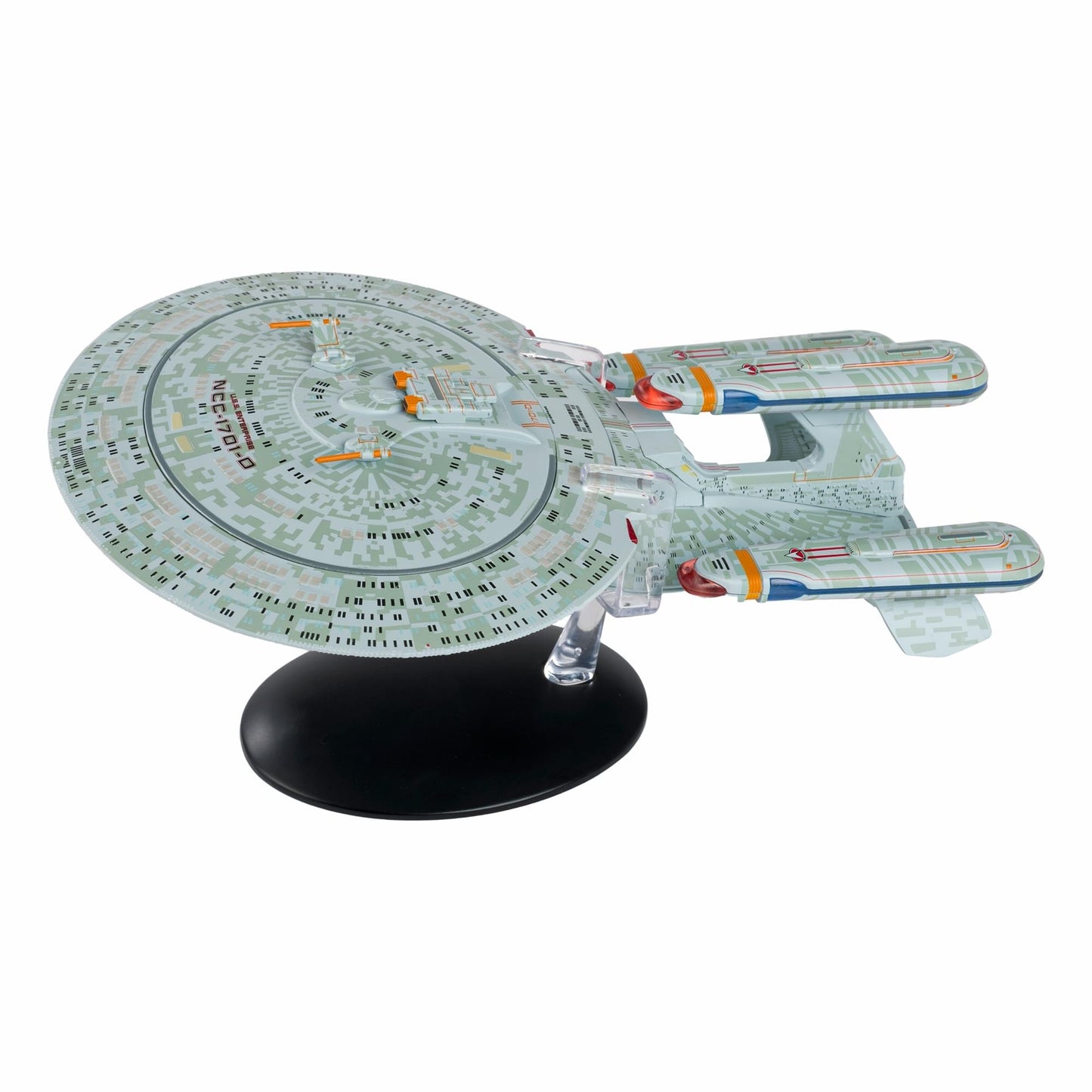 Three-quarter front view of the die-cast USS Enterprise NCC-1701-D Dreadnought starship model on a display stand