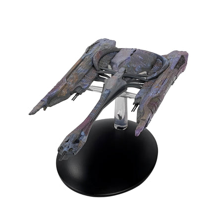 Close-up of the intricately detailed hull plating and weaponry array on the Klingon QOJ Class ship replica