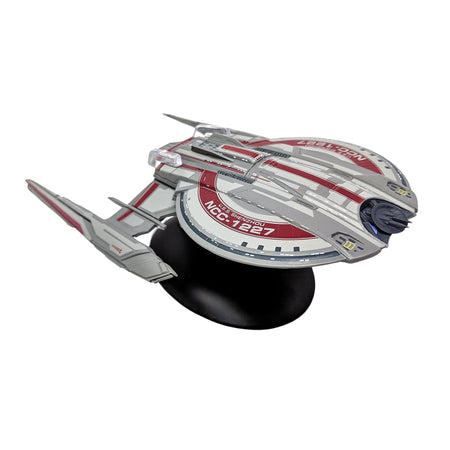 Front quarter profile view of the U.S.S. Shenzhou XL starship replica on a black display stand