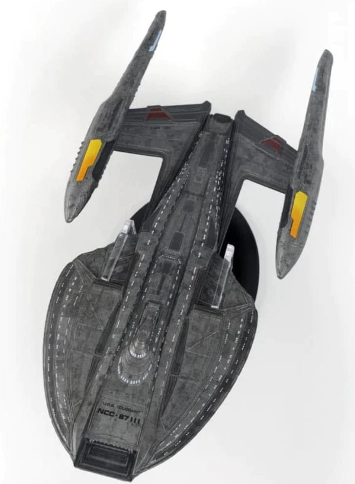 Eaglemoss Star Trek die-cast replica of the USS Toussaint starship viewed from an angled perspective, showing its main hull and warp nacelles