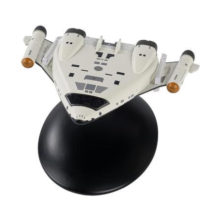 Die-cast Star Trek starship replica viewed from an overhead three-quarters angle, showcasing detailed hull plating and registry markings