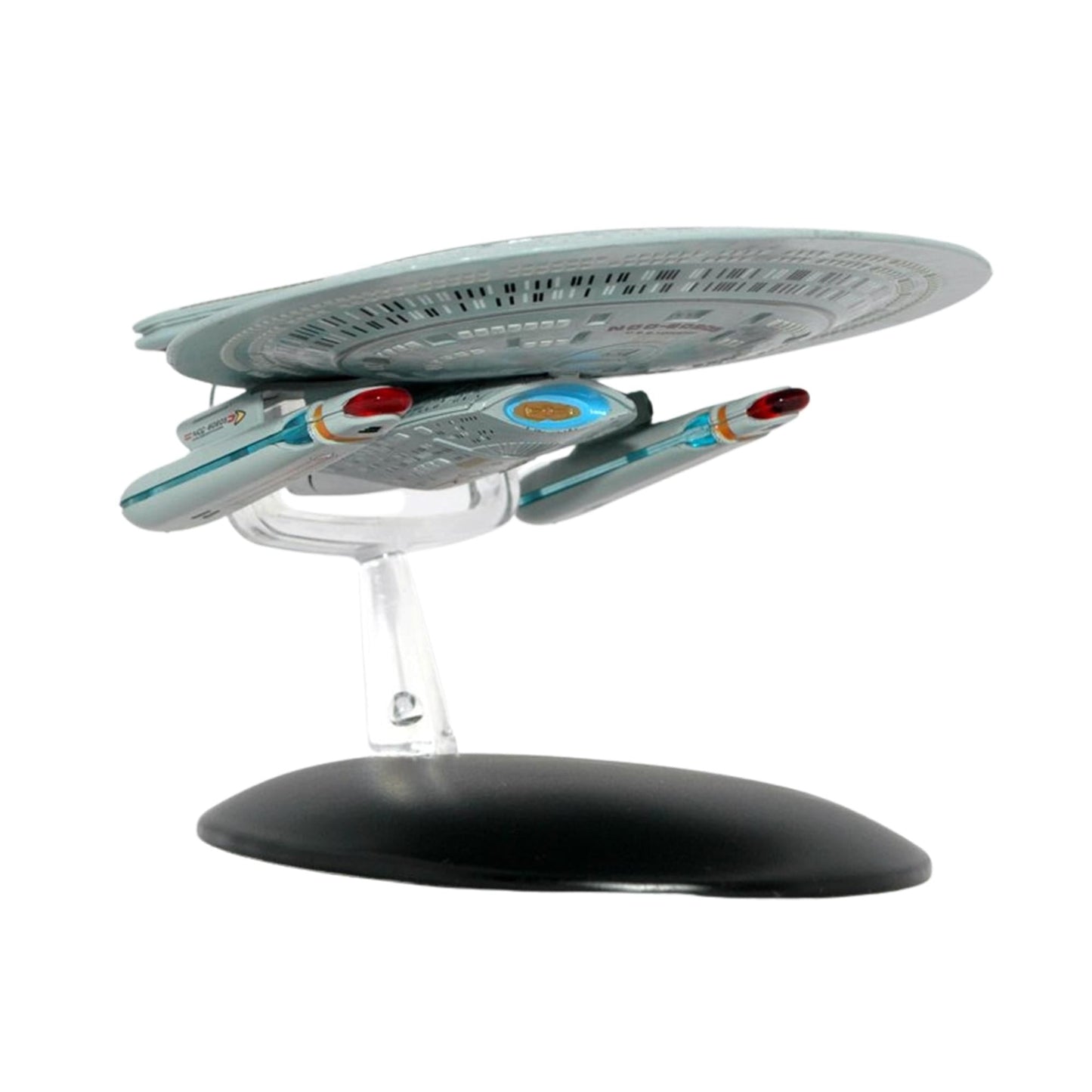 Angled view of the starship model mounted on its branded Starfleet display base