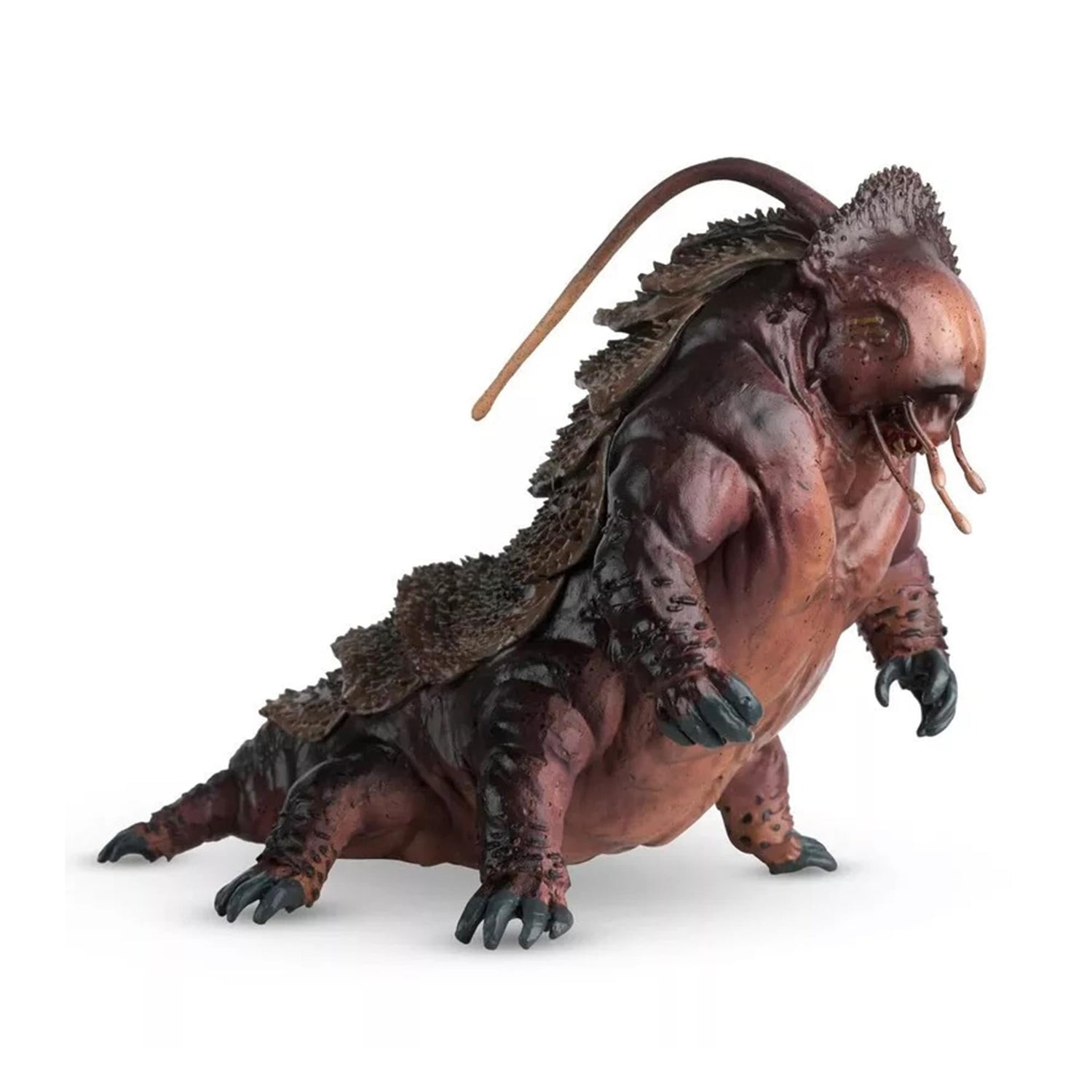 The Tardigrade figurine displayed alongside a Starfleet delta insignia plaque for scale context