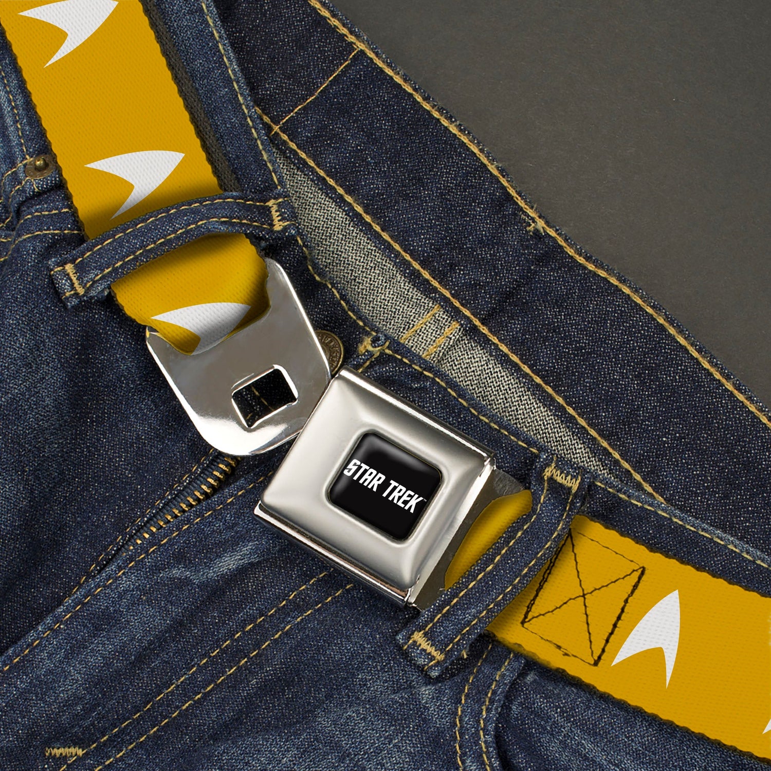 Close-up of the authentic automotive-style push-button buckle.