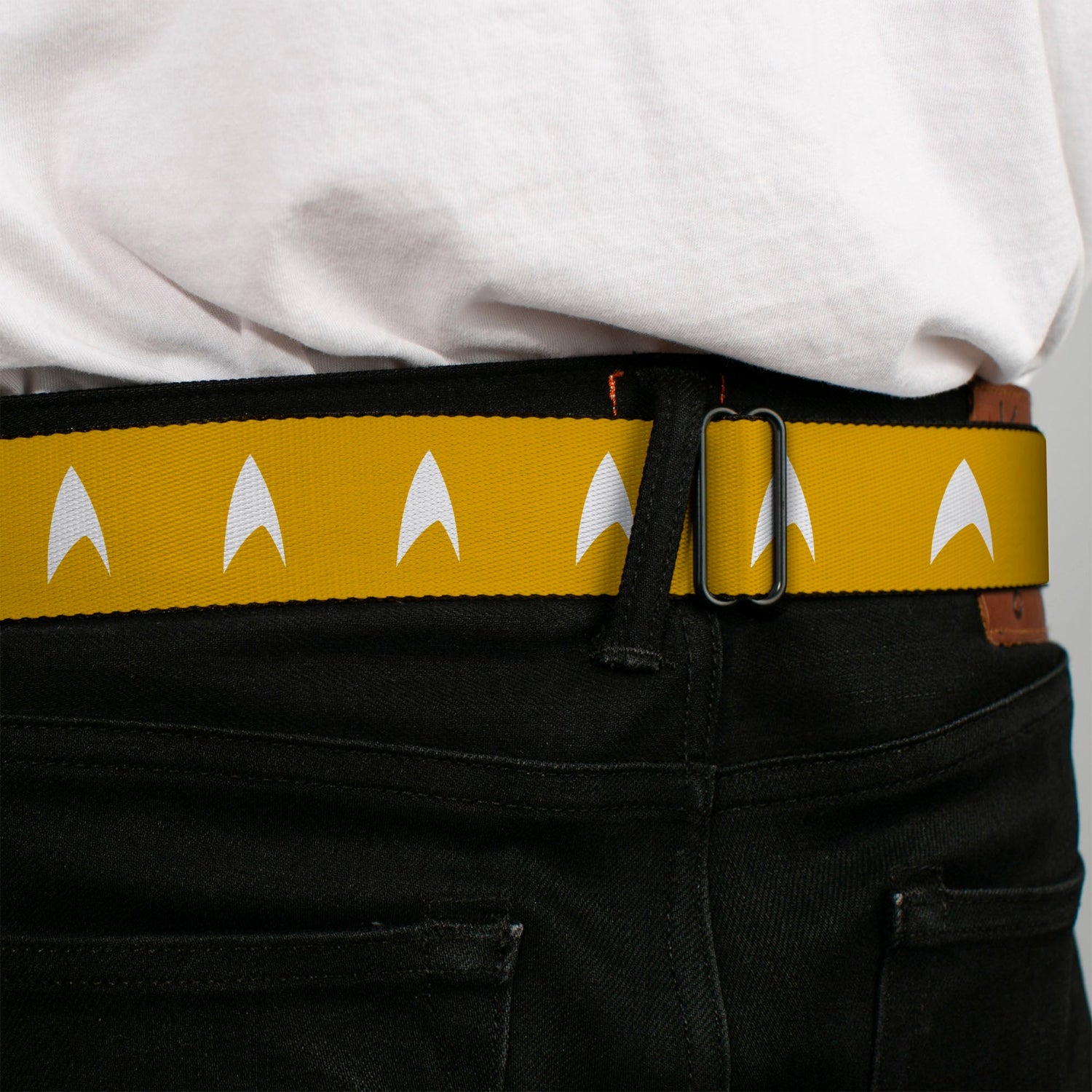 Model wearing the Star Trek Starfleet Insignia belt with casual jeans.