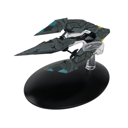 Three-quarter angle view of the die-cast Star Trek Recluse Class Tholian Carrier model resting on a display stand