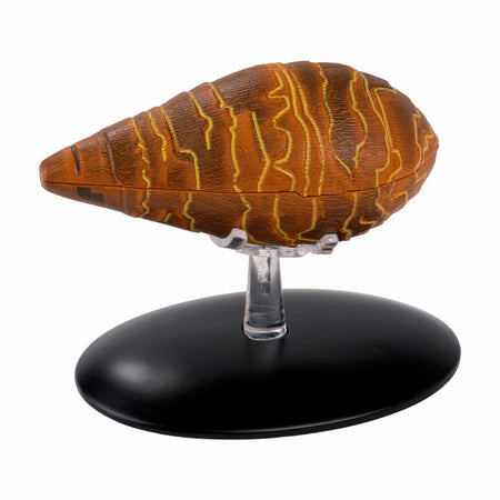 Die-cast collectible model of the Star Trek sentient bio-ship Gomtuu Tin Man viewed from a three-quarters angle