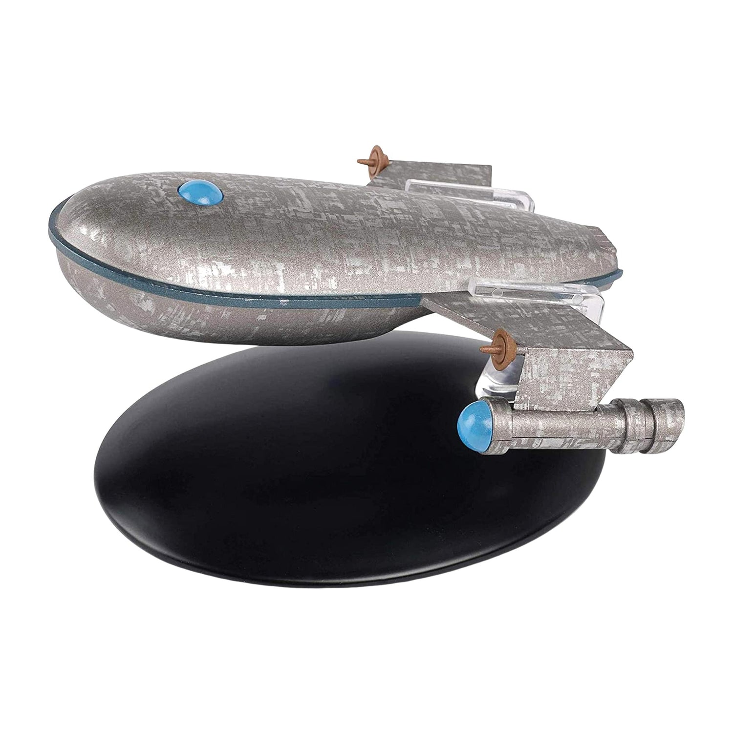 Starboard side angle of Harry Mudd's Class J transport ship model on an official display stand