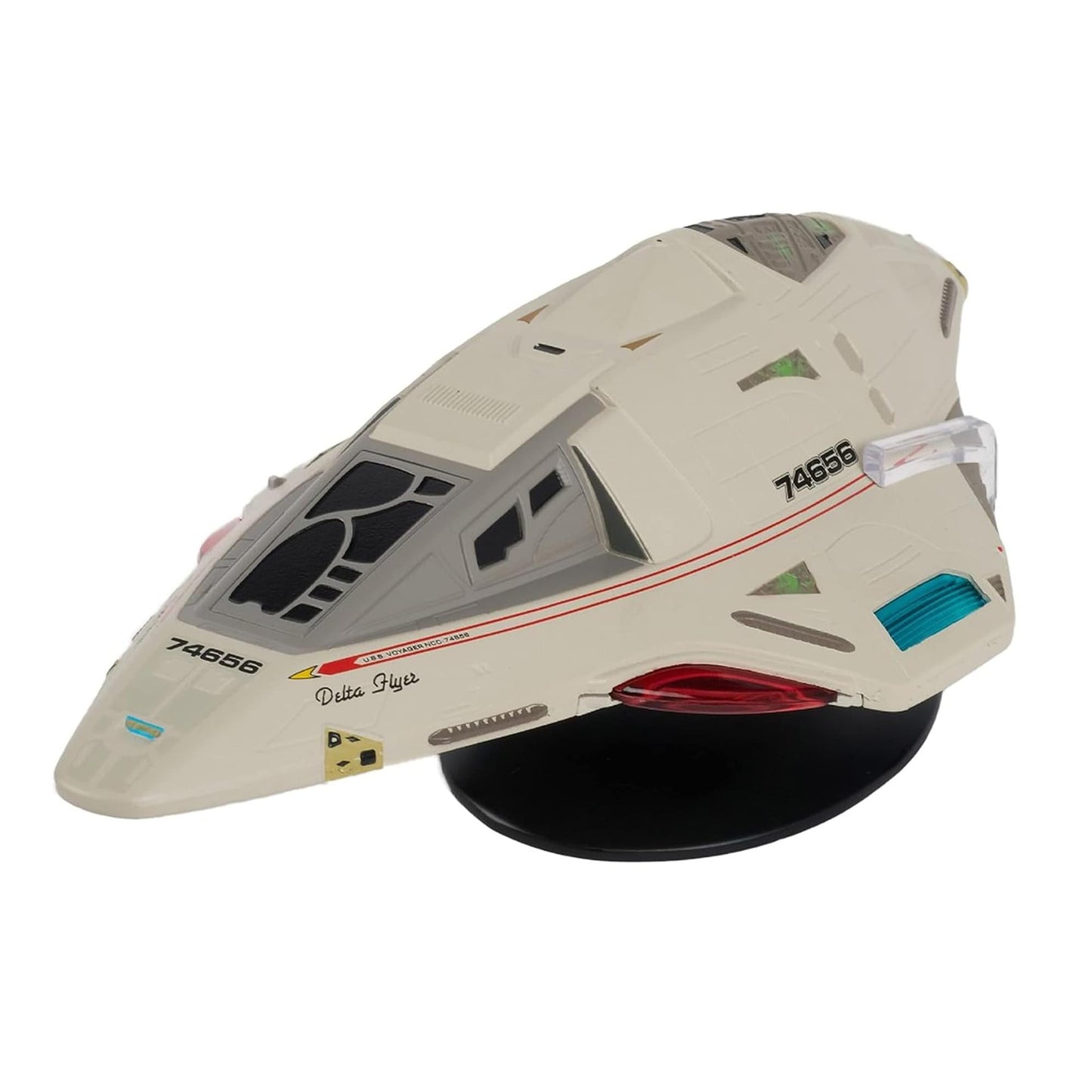 Angle view of the die-cast Delta Flyer starship model resting on a display stand
