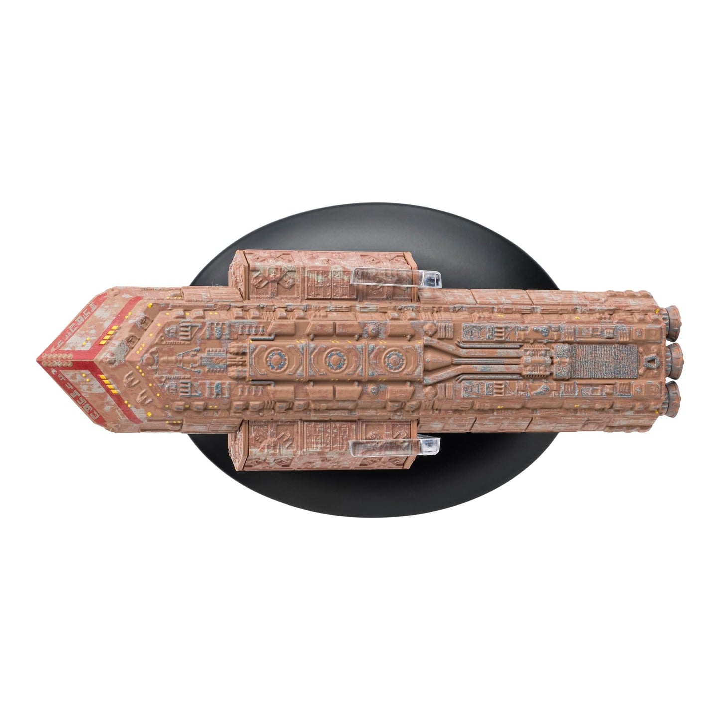 Side profile view of The Batris die-cast starship mounted on its collector display stand
