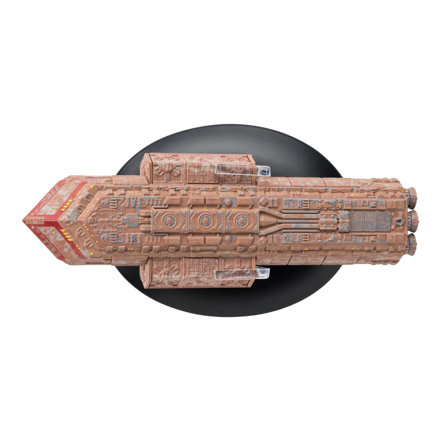 Side profile view of The Batris die-cast starship mounted on its collector display stand