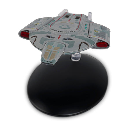 Top-down view of the I.S.S. Defiant die-cast model highlighting hull plating and Terran Empire markings