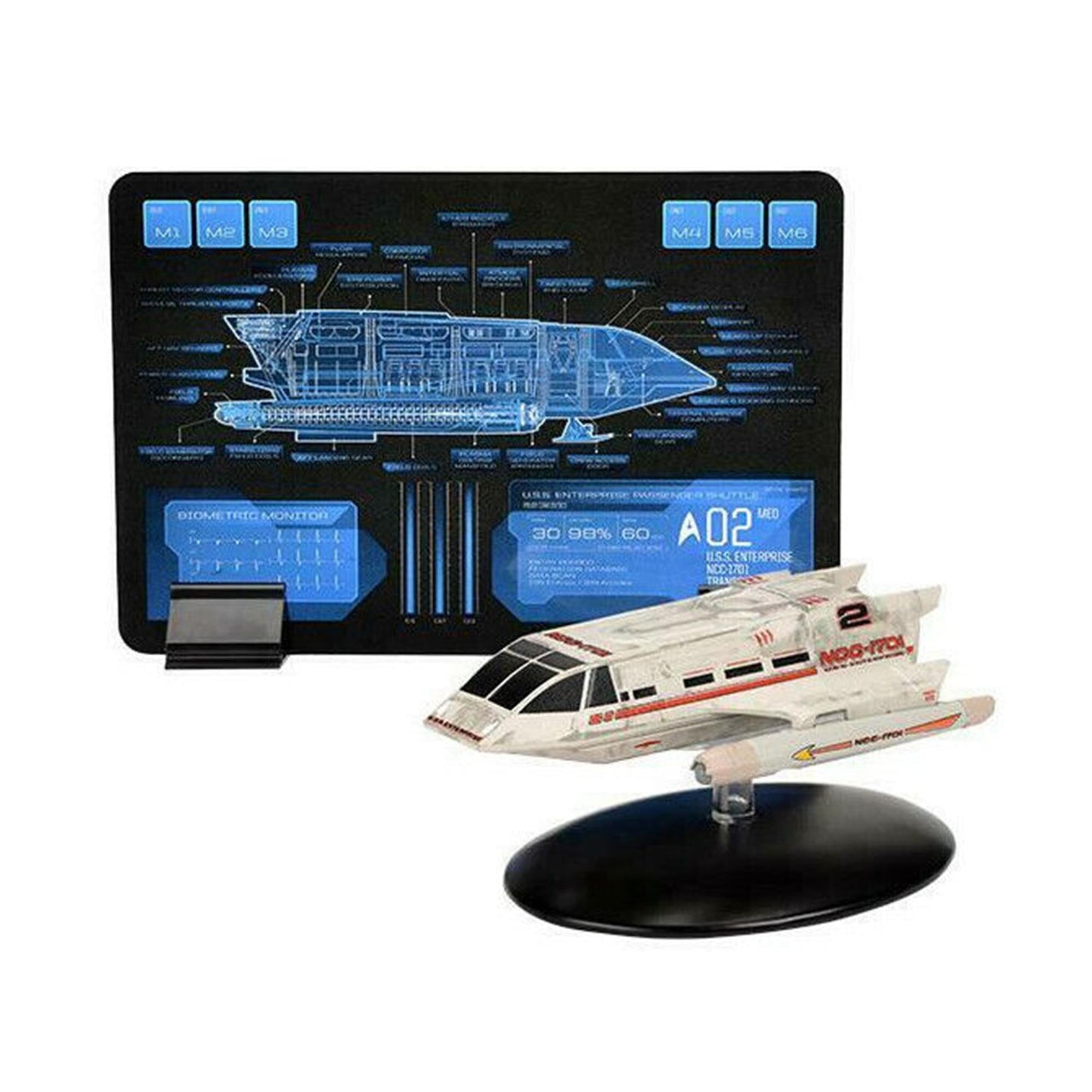 Close-up of the hand-painted Starfleet insignia and hull paneling on a shuttlecraft model