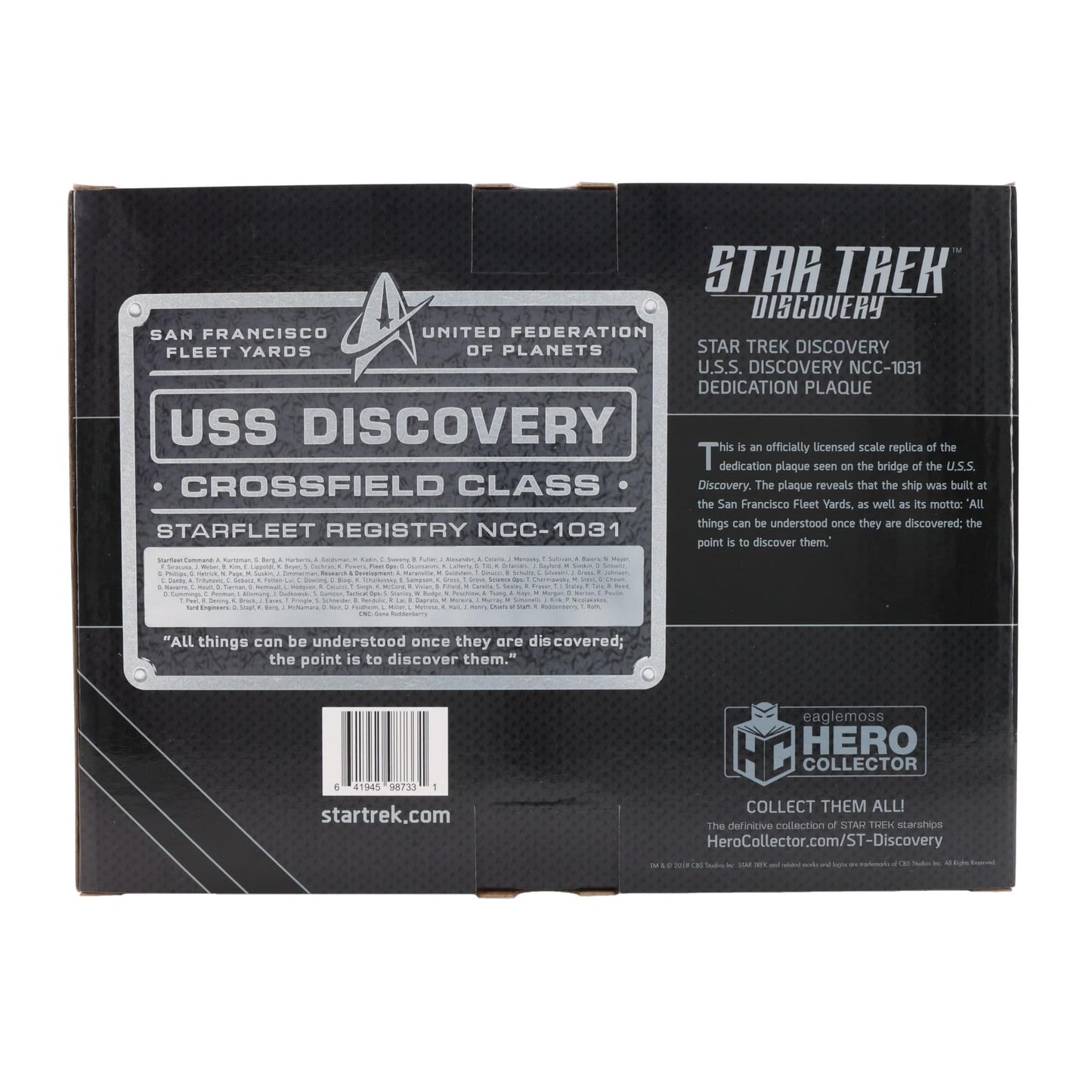 Scale perspective shot of the 9-inch Star Trek: Discovery plaque held in hand to demonstrate size