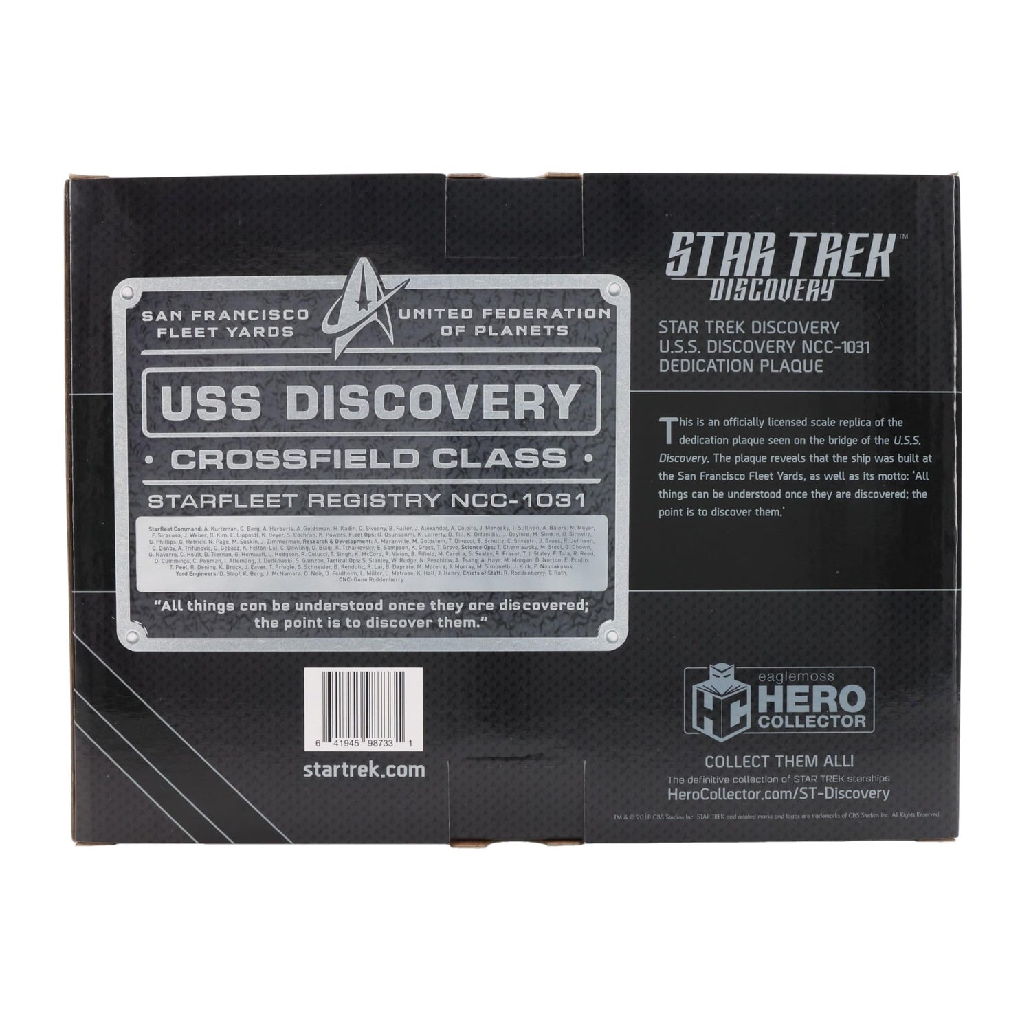 Scale perspective shot of the 9-inch Star Trek: Discovery plaque held in hand to demonstrate size