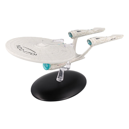 Front three-quarter view of the USS Enterprise starship model resting on a black display stand