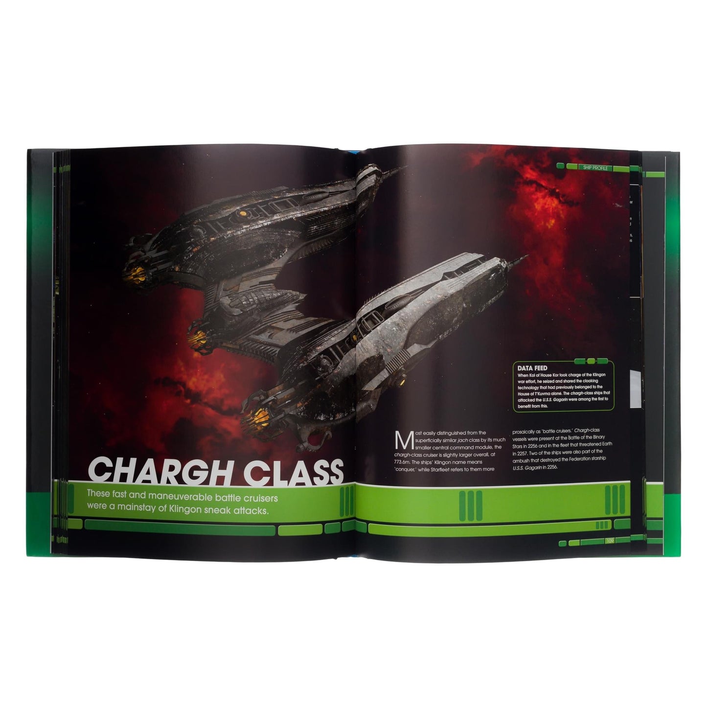 Open book spread showcasing detailed technical schematics and orthogonal plan views of a Klingon starship