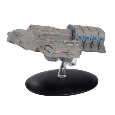 Profile view of the Star Trek Dala ship die-cast model resting on a neutral display surface.