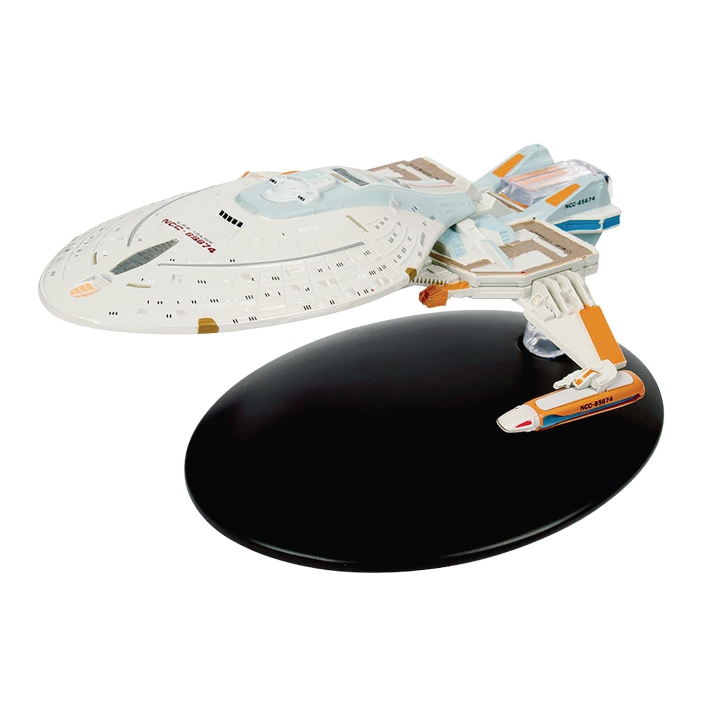 Angle view of the USS Yaeger starship replica mounted on a display stand against a dark background